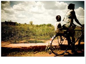 africa woman on bicycle